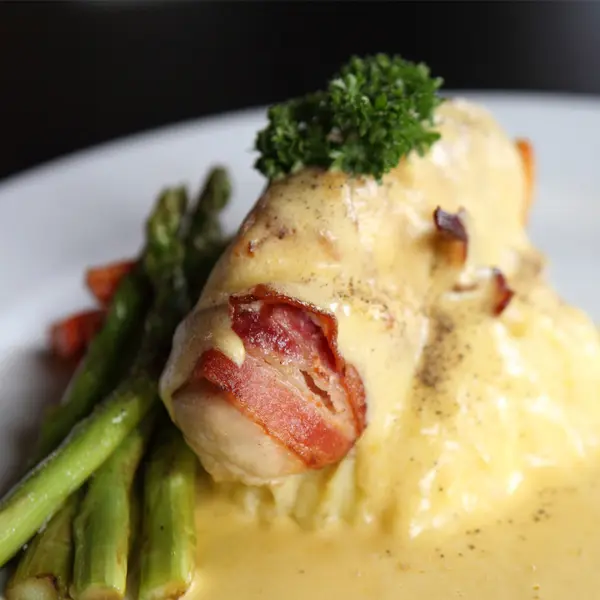 Bacon Wrapped Chicken With Creamy Cheese Sauce