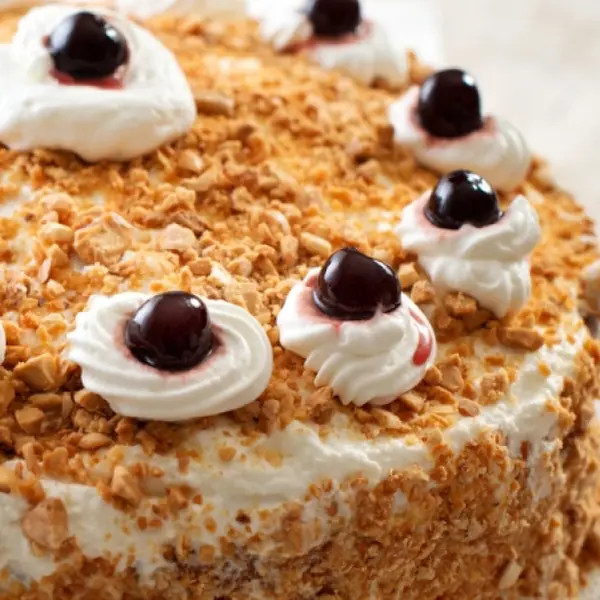 Four Layer Classic White Cake With Honey Buttercream Frosting
