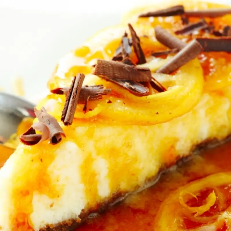 Cheesecake with Caramel Orange Sauce