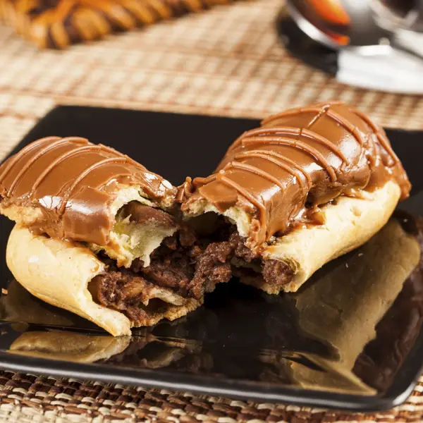 Chocolate Stuffed Caramel Glazed Eclairs
