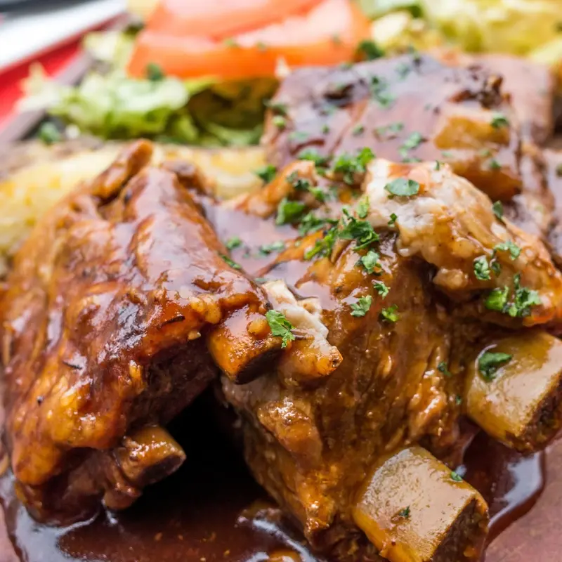 Baked Saucy Ribs