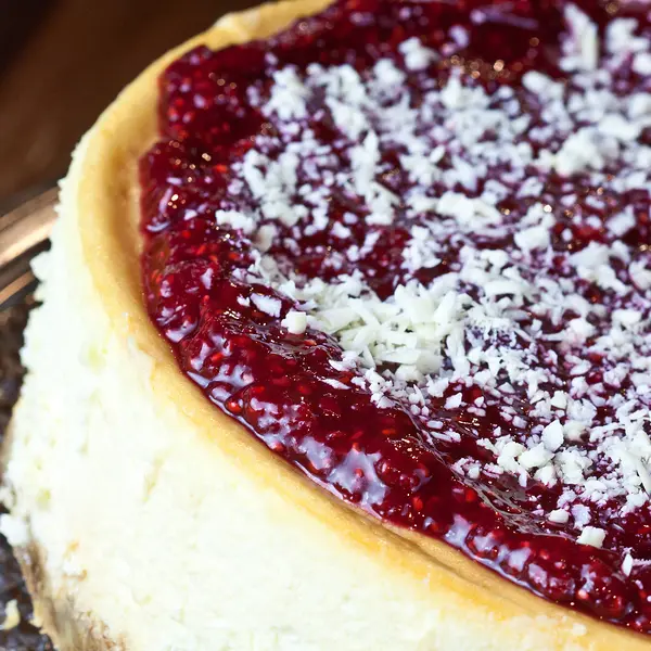 Luscious Lemon Cheesecake With Raspberry Glaze